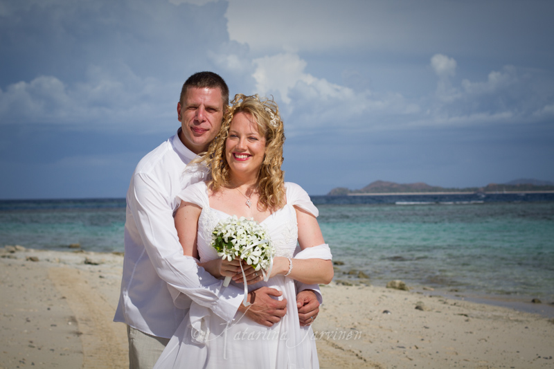 bride and groom on a beach